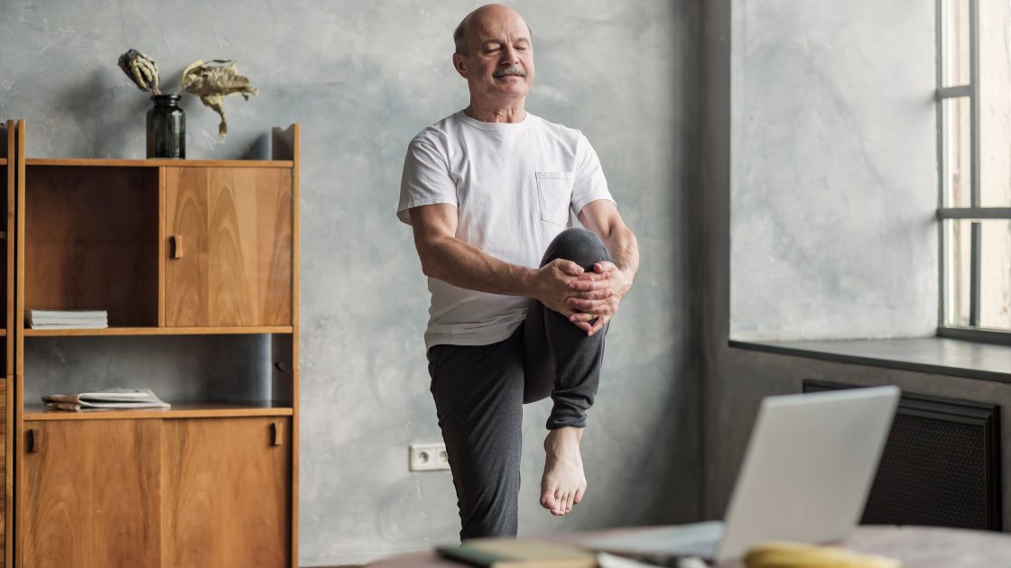 man-doing-yoga_health-focused-online-event-ideas.jpg