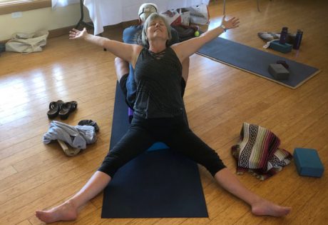 Organizer Nancy Markow practicing yogs