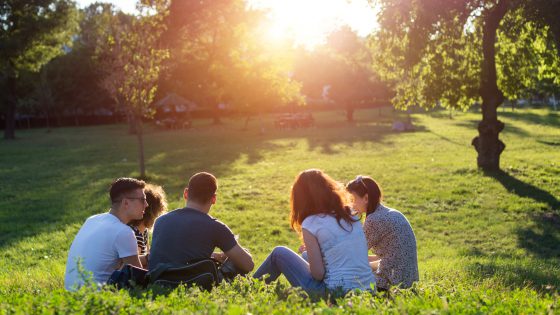 friends-hanging-out-outside_resume-your-social-life